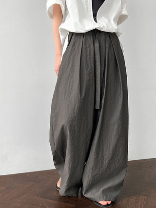 Relaxed Drawstring Pleated Wide-leg Trousers by painevida