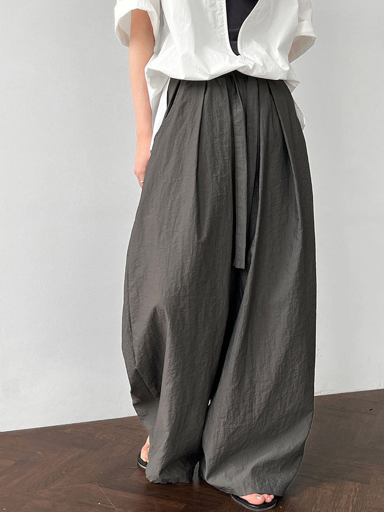 Relaxed Drawstring Pleated Wide-leg Trousers by painevida
