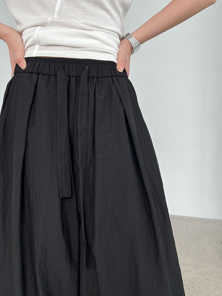 Relaxed Drawstring Pleated Wide-leg Trousers by painevida