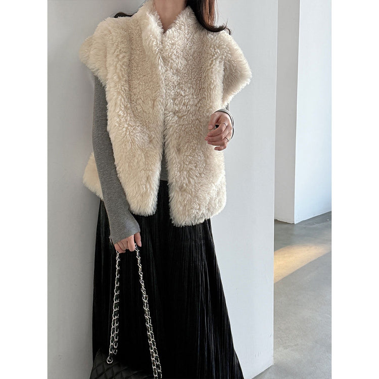 Ivory plush faux shearling vest with extended shoulders, front view