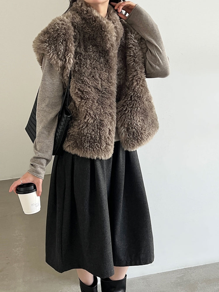 Taupe curly-textured vest, angled view