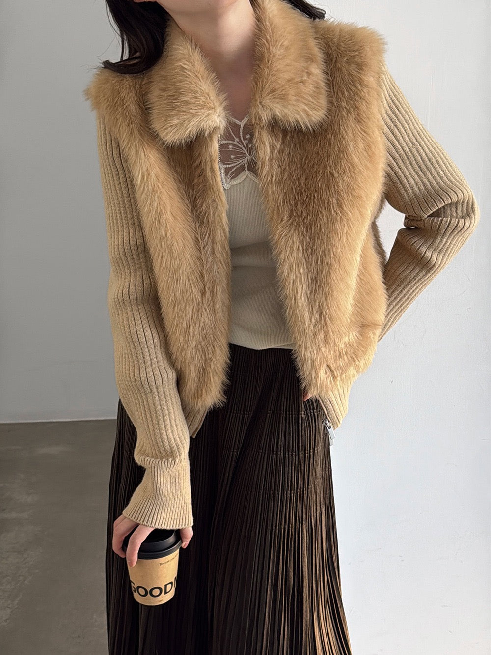 Camel plush panel knit jacket worn open