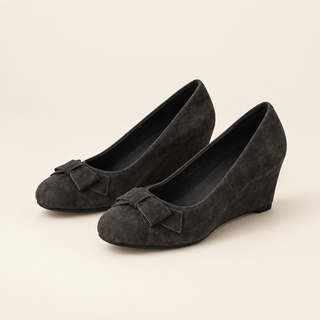 Dark gray suede bow wedge pumps